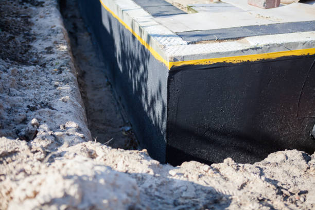 Professional Exterior Waterproofing technician working in Jersey City, NJ